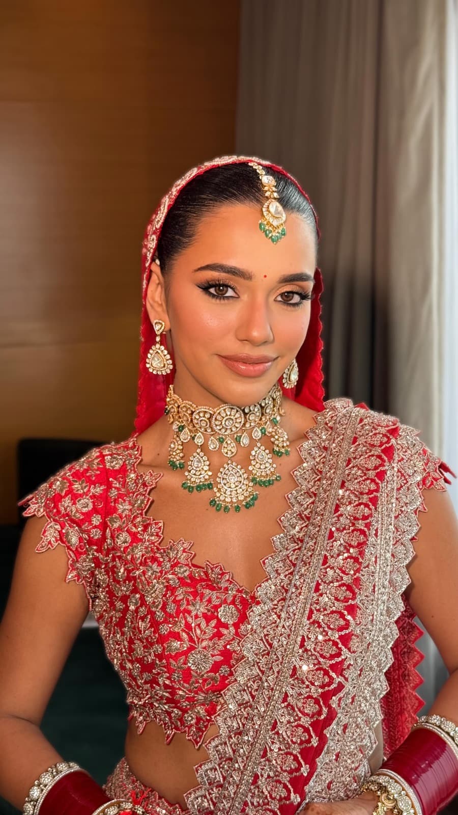 Bridal look by Sneha Chowdhary — rose couture, luminous skin and softly defined eyes